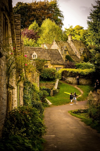 A view of Petite France, showing the colorful French-style buildings and cobblestone streets, set against a backdrop of rolling hills and green landscapes.