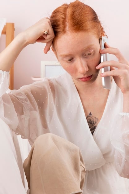 A woman applying essence to her face with her hands, showcasing the gentle patting technique, with a focus on the dewy glow of her skin.