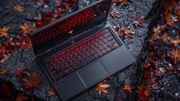 An Acer Nitro 5 gaming laptop with its lid open, showcasing a sci-fi-themed game running on the screen. The keyboard is illuminated with red backlighting, and the laptop is placed on a gaming mousepad.
